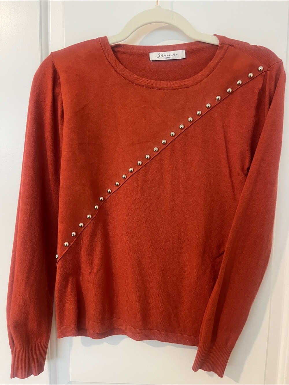 Sioni Rust Orange Sweater with Diagonal Suede and Silver Studs